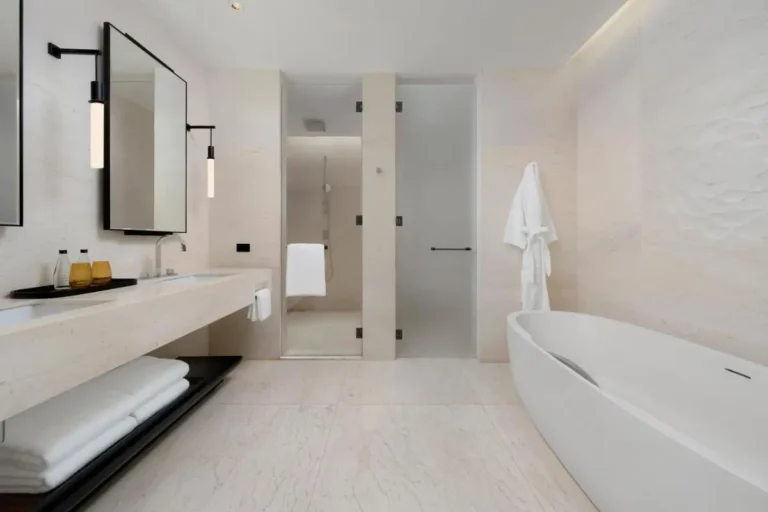 Modern Minimalist Bathroom with Bathtub and Dual Showers in Pathumwan Bangkok