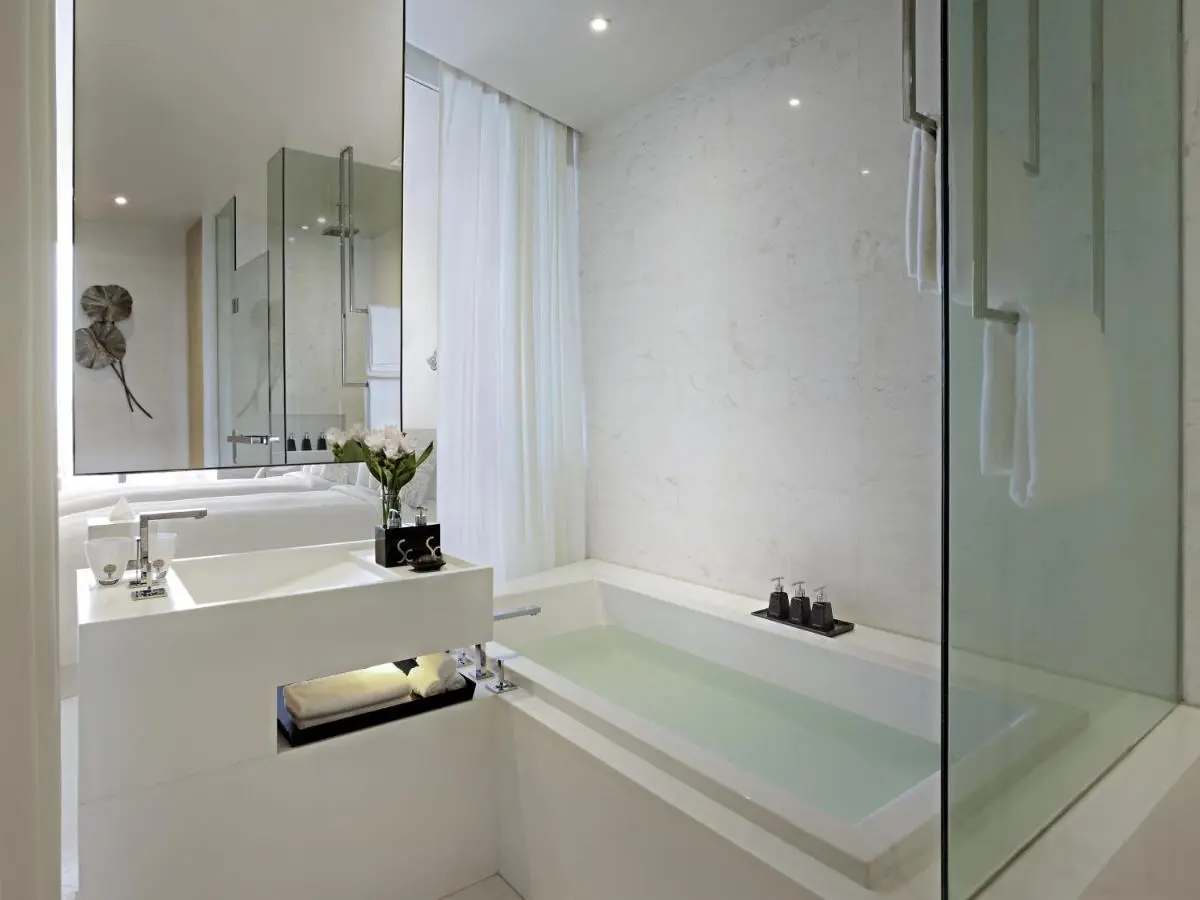 Modern Minimalist Bathroom with Built-In Bathtub and Glass Shower in Bang Rak