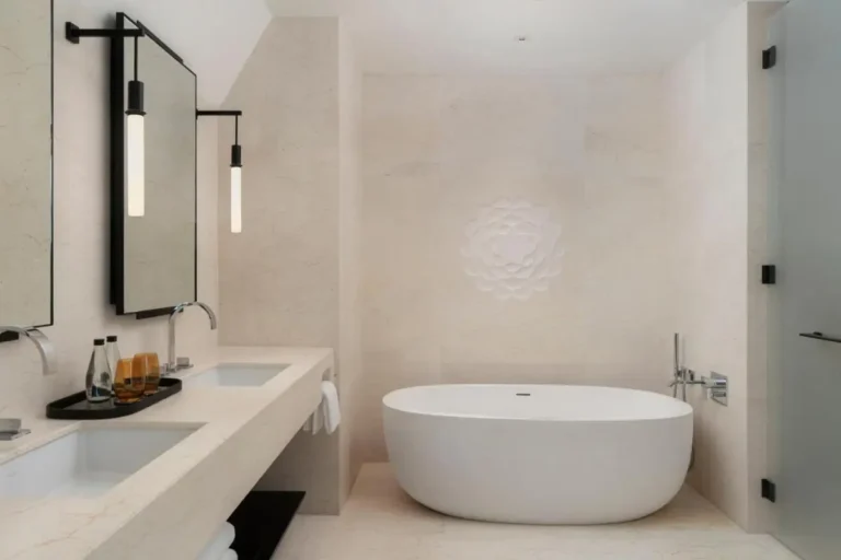 Modern Minimalist Bathroom with Freestanding Bathtub and Dual Sinks in Pathumwan