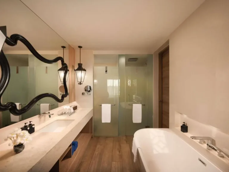 Modern Minimalist Bathroom with Freestanding Bathtub and Frosted Glass Shower Doors at Karon Beach