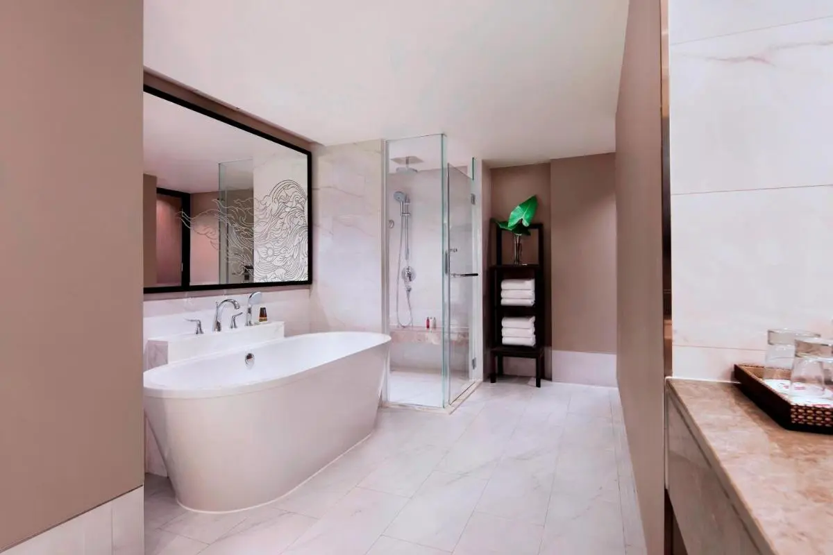 Modern Minimalist Bathroom with Freestanding Tub and Glass Shower in Khlong Toei