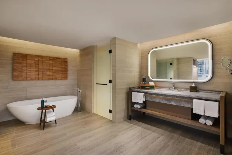 Modern Minimalist Bathroom with Freestanding Tub and Vanity in Khlong Toei Bangkok