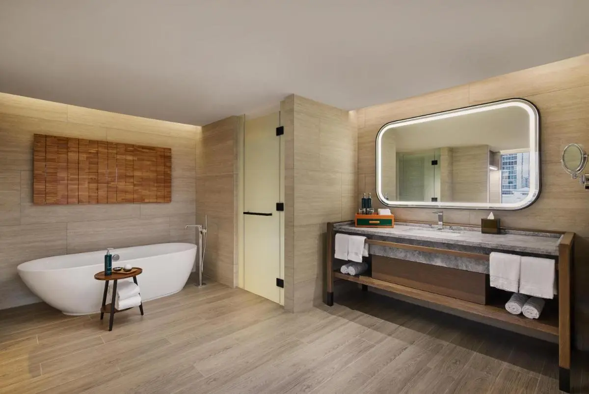 Modern Minimalist Bathroom with Freestanding Tub and Vanity in Khlong Toei Bangkok