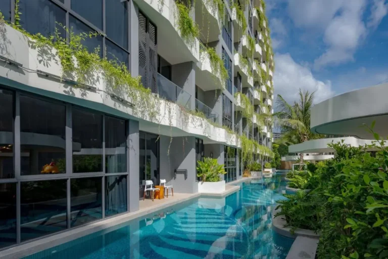 Modern Multi-Story Building Featuring Narrow Swimming Pool and Vertical Garden at Bang Tao Beach