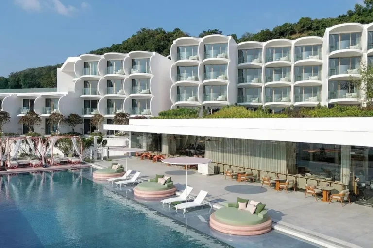 Modern Multi-Story Building with Outdoor Pool and Lounge Area at Panwa Beach