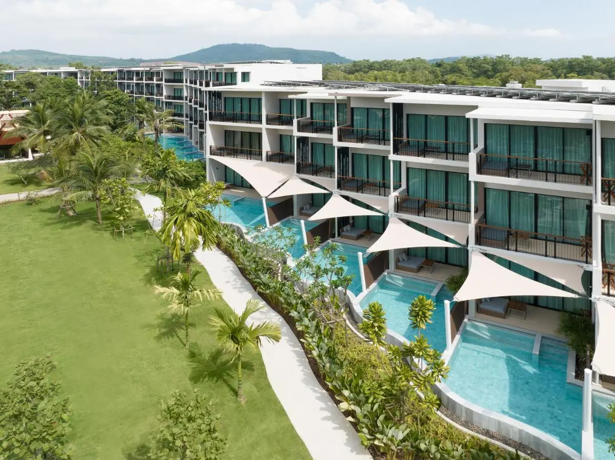 Modern Multi-Story Building with Private Pools and Shaded Lounging Areas Near Mai Khao Beach