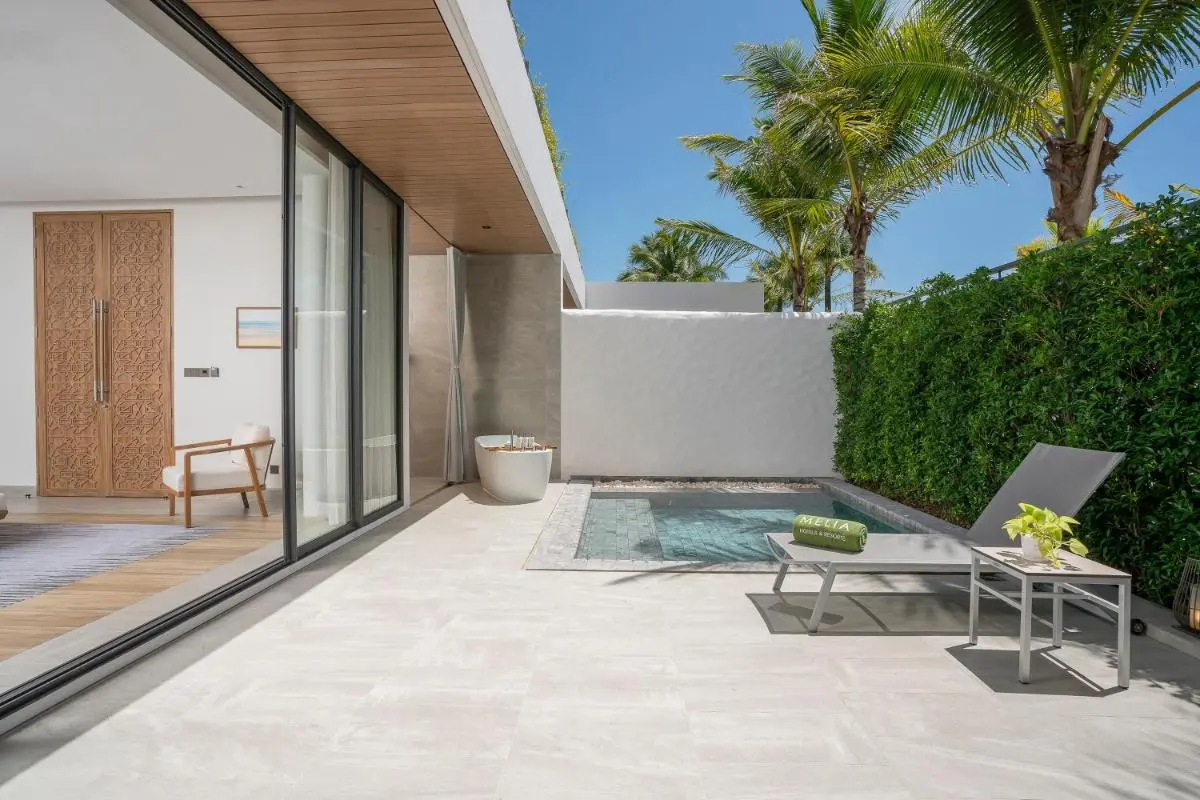 Meliá Phuket Mai Khao Modern Outdoor Patio with Small Pool, Lounge Chair, and Freestanding Bathtub at Mai Khao Beach Phuket Province