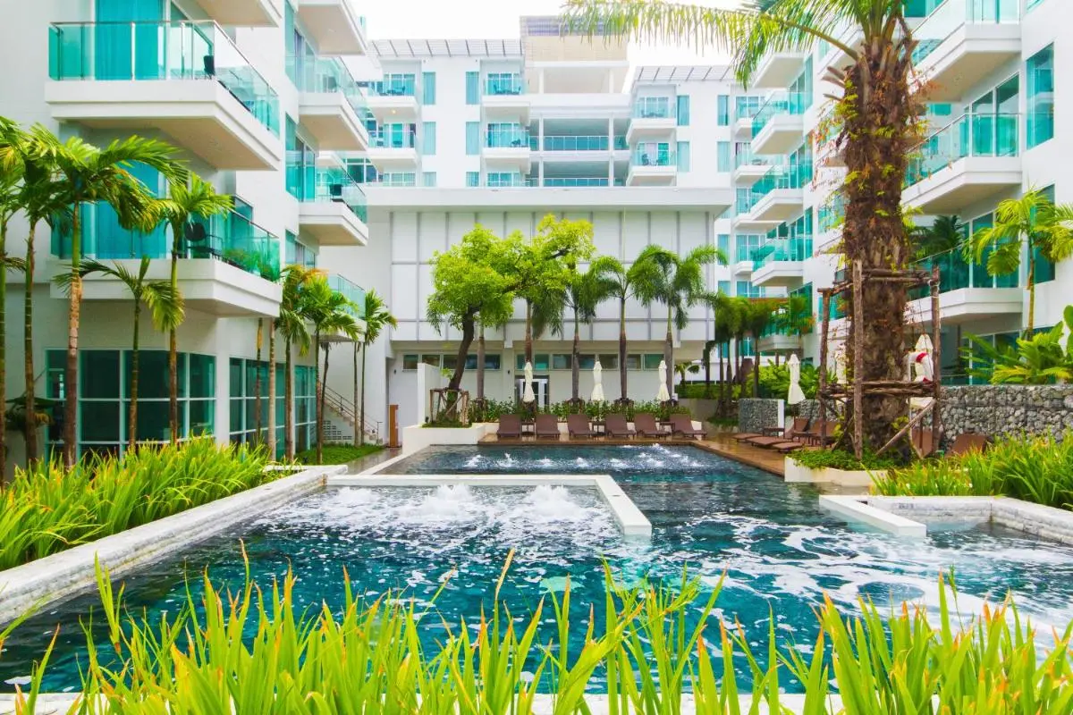 Modern Outdoor Pool Area with Jacuzzi and Tropical Landscaping at Patong Beach
