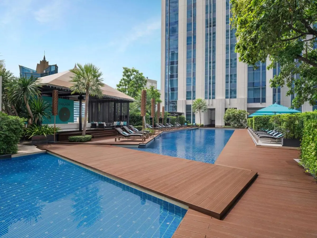 Modern Outdoor Pool Area with Lounge and Pavilion in Wattana Bangkok