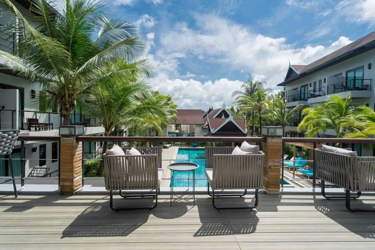 Howard Johnson by Wyndham Phuket Naiyang Modern Outdoor Pool Area with Lounge Seating and Tropical Landscaping in Thalang Phuket Province