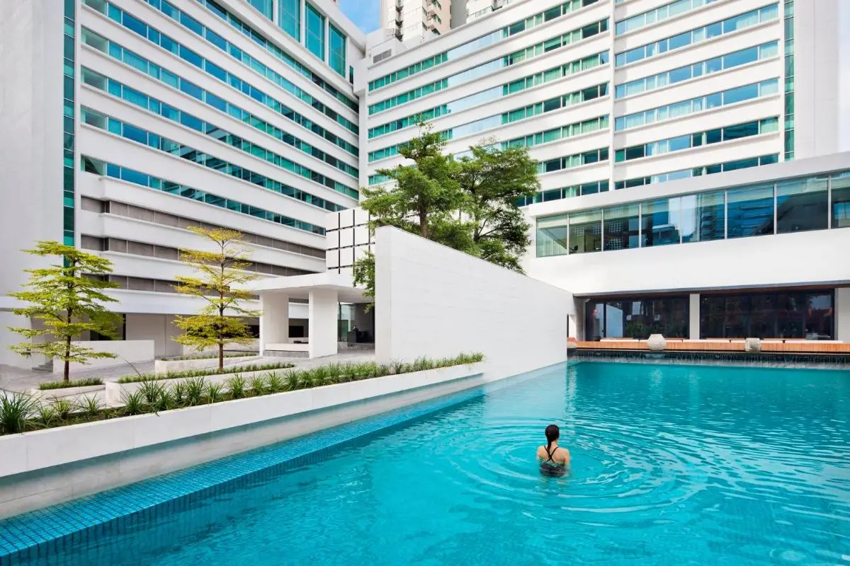 Modern Outdoor Swimming Pool and Relaxation Area in Sathorn Urban Complex