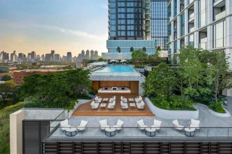 Modern Outdoor Swimming Pool and Relaxation Area with Jacuzzi in Pathumwan Bangkok