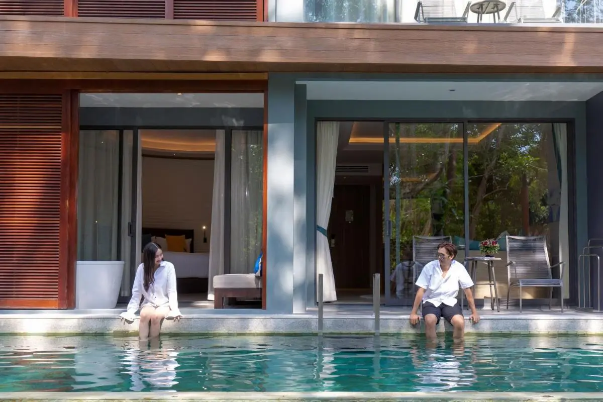 Modern Outdoor Swimming Pool with Adjacent Sliding Glass Doors at Patong Beach