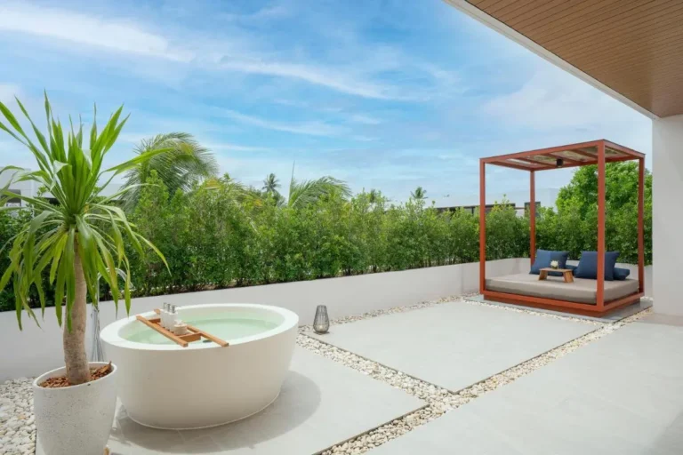 Modern Outdoor Terrace with Freestanding Bathtub and Daybed at Mai Khao Beach