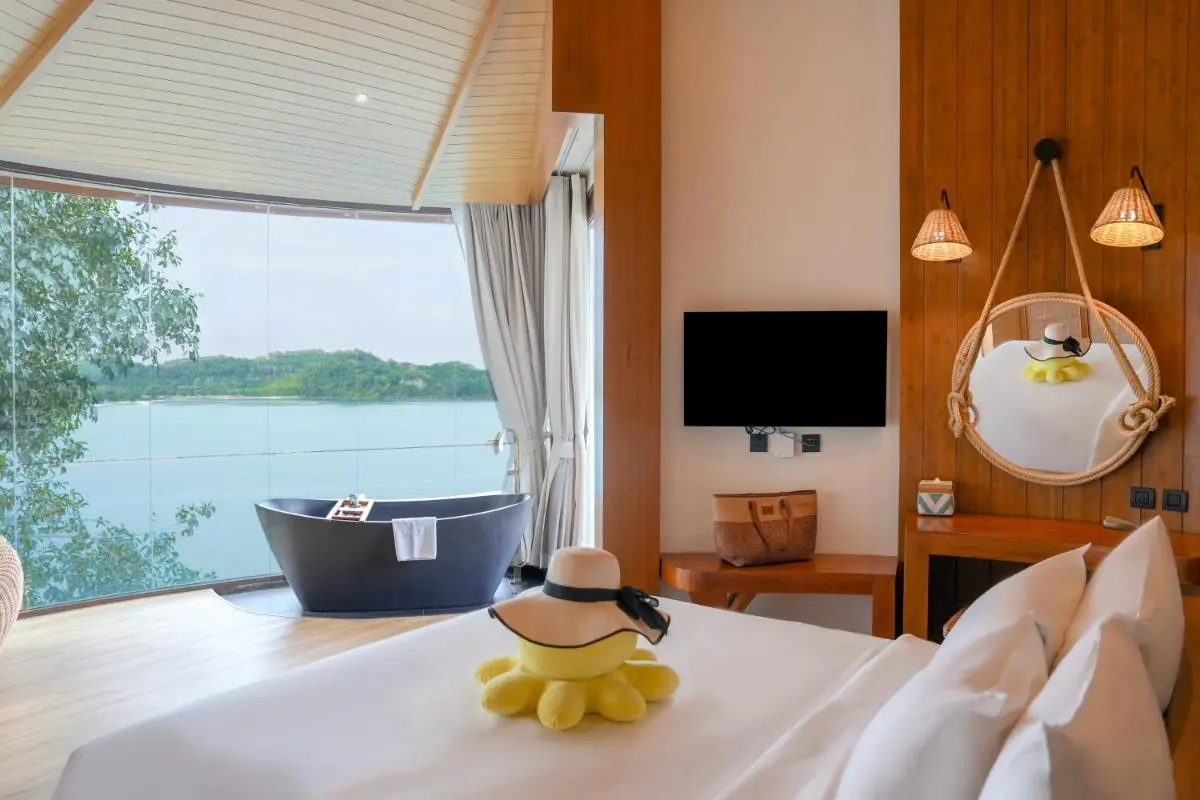 SINAE Phuket Luxury Hotel Modern Relaxation Room with Freestanding Bathtub and Panoramic Water Views in Phuket Town Thailand