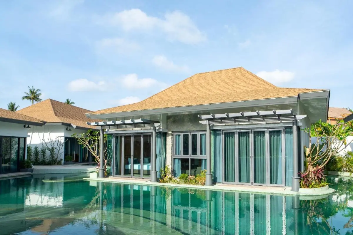 Tajh Pool Villas Modern Residential Compound Featuring Large Irregular Swimming Pool in Chalong