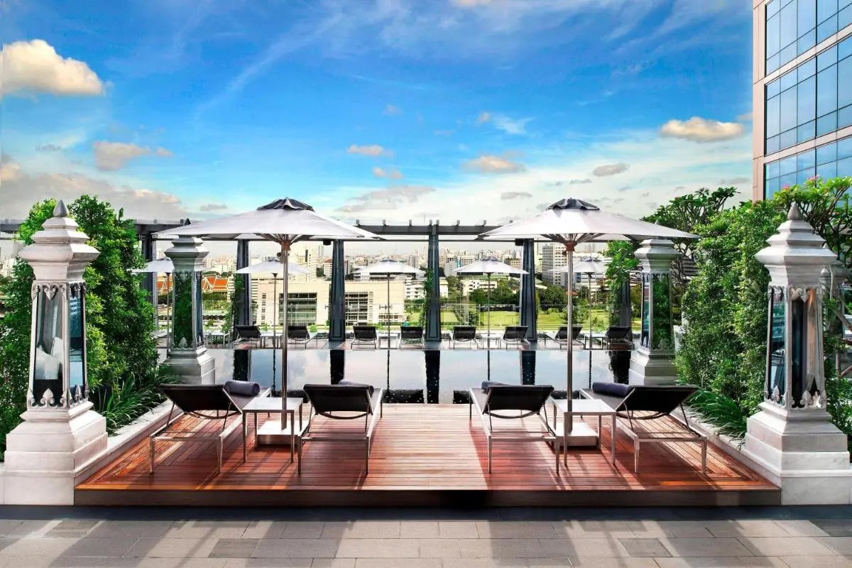 The St. Regis Bangkok Modern Rooftop Infinity Pool with Lounge Area and City Views in Pathumwan Bangkok