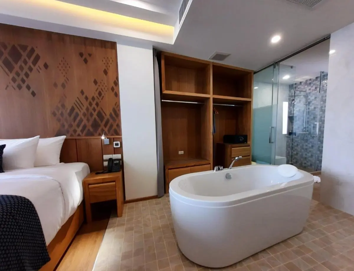 Modern Room with Freestanding Bathtub and Glass Shower in Chang Khlan Chiang Mai