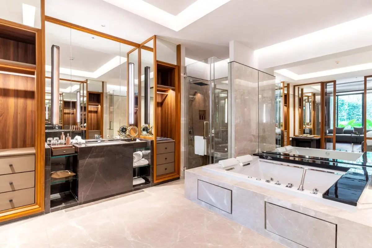 Modern Spacious Bathroom with Built-In Jacuzzi and Rainfall Shower in Sathorn