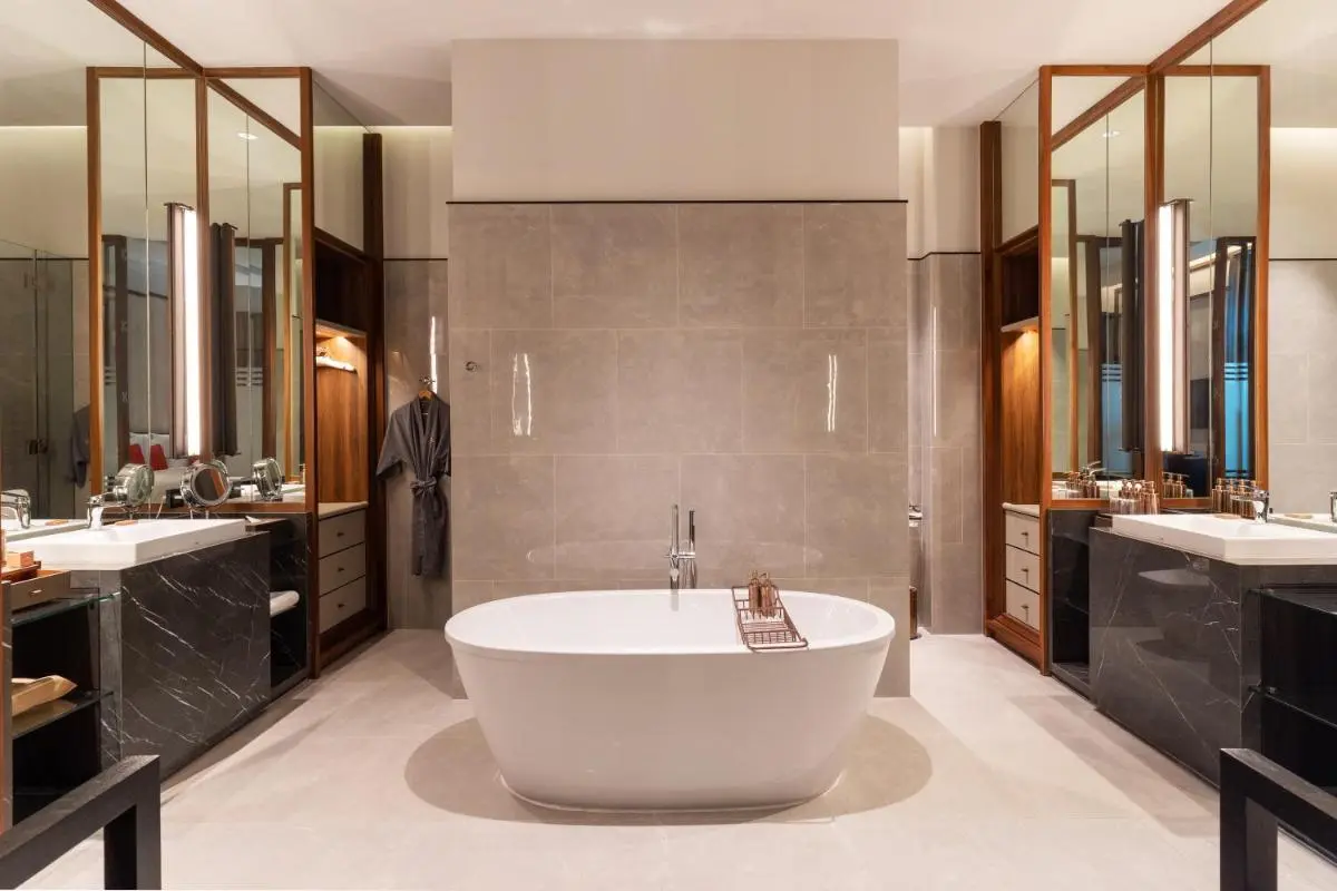 Modern Spacious Bathroom with Freestanding Bathtub and Dual Vanities in Sathorn