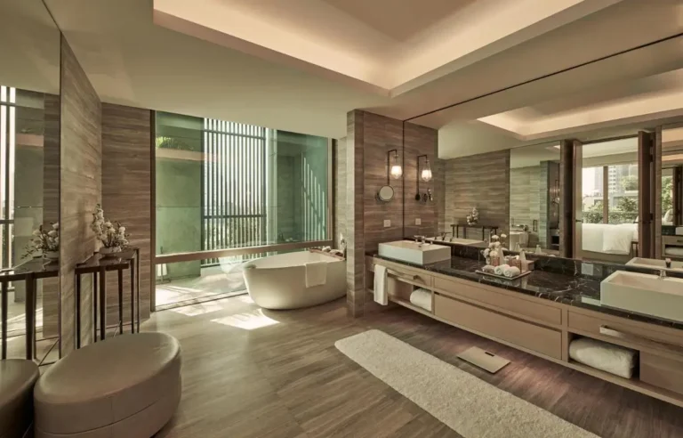 Modern Spacious Bathroom with Freestanding Tub and Dual Vanity in Sathorn Bangkok