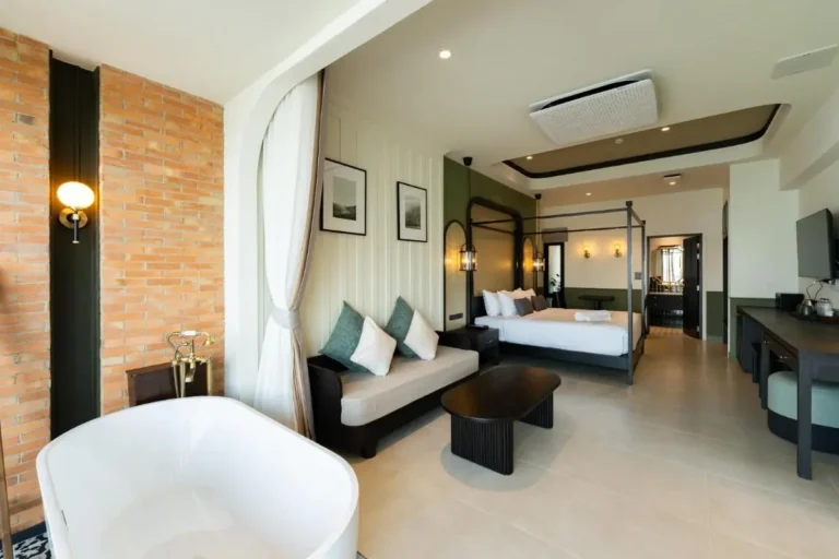 Modern Suite with Freestanding Bathtub and Green Accents in Phra Sing Chiang Mai