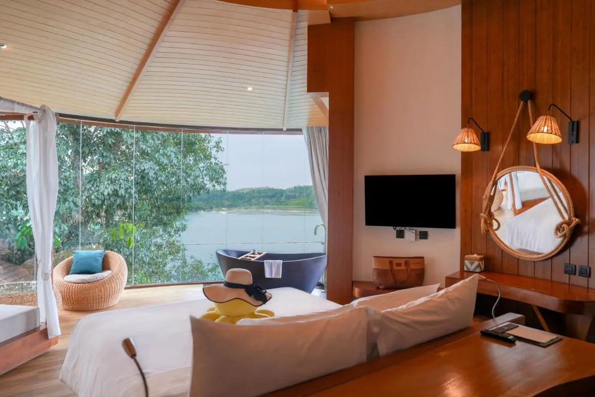 Modern Wellness Room Featuring Freestanding Bathtub and Scenic Views in Phuket Town