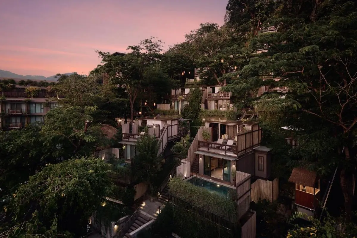 Dinso Resort & Villas Phuket, Vignette Collection by IHG Multi-Level Hillside Complex with Private Pools and Natural Wood Architecture at Dusk Phuket Province