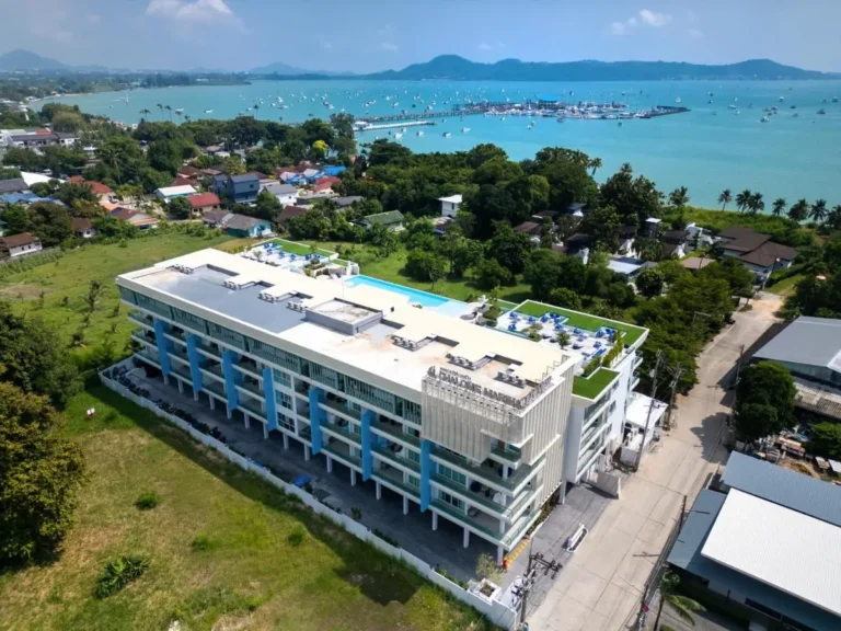 Multi-Story Coastal Building with Rooftop Pools and Scenic Bay Views at Rawai Beach Multi-Story Coastal Building with Rooftop Pools and Scenic Bay Views at Rawai Beach