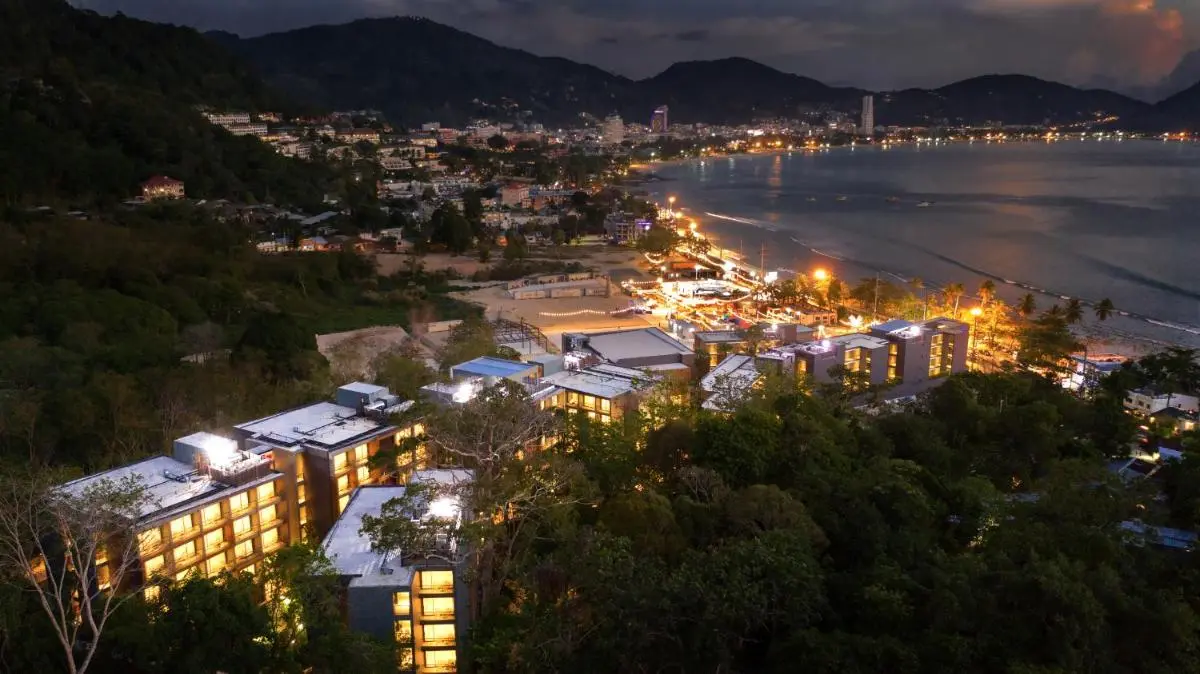 Phuket Province Nighttime Coastal Urban View of Patong Beach with Illuminated Buildings and Bay