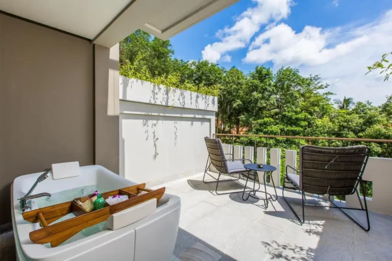 Outdoor Balcony Whirlpool Bathtub with Seating and Greenery View at Patong Beach