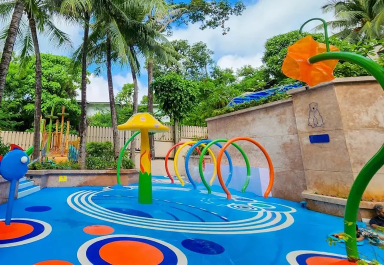 Outdoor Children’s Water Play Area with Colorful Sprinklers and Safety Flooring at Kata Beach