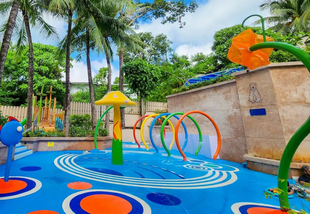 Novotel Phuket Kata Avista Resort and Spa Outdoor Children’s Water Play Area with Colorful Sprinklers and Safety Flooring at Kata Beach Thailand