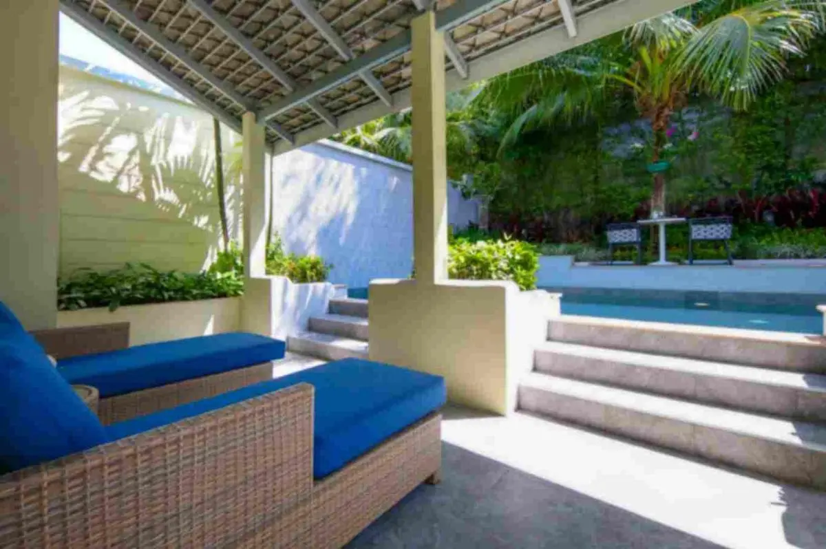 Outdoor Elevated Pool and Covered Patio with Lounge Seating in Phuket Town