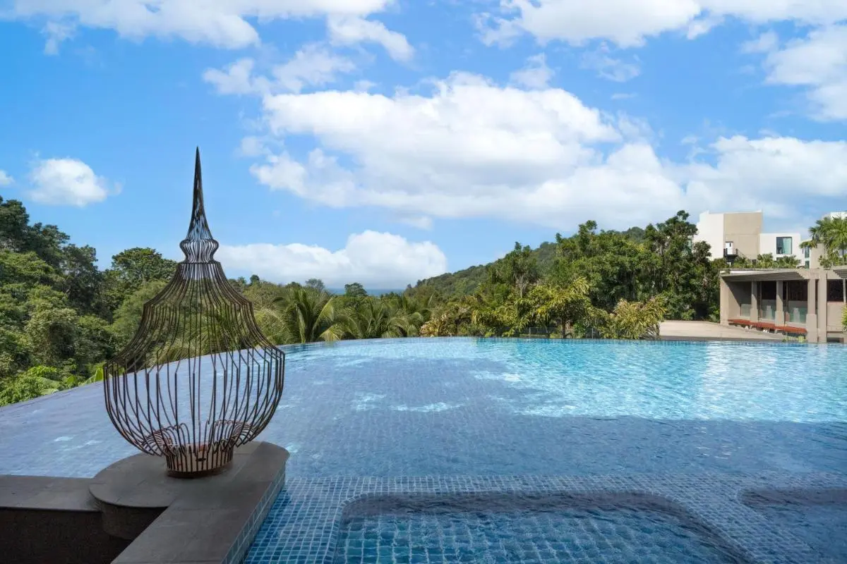 Avista Hideaway Phuket Patong - MGallery Outdoor Infinity Pool and Jacuzzi with Scenic Natural Backdrop at Patong Beach