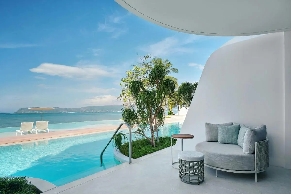 Veranda Resort Phuket, Autograph Collection Outdoor Infinity Pool and Relaxation Area Overlooking Ocean at Panwa Beach