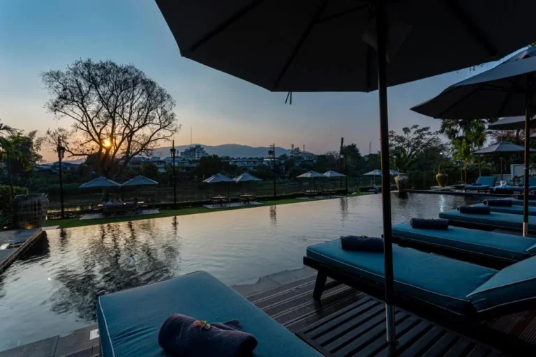 Outdoor Infinity Pool and Relaxation Area with Scenic Views in Fa Ham Chiang Mai