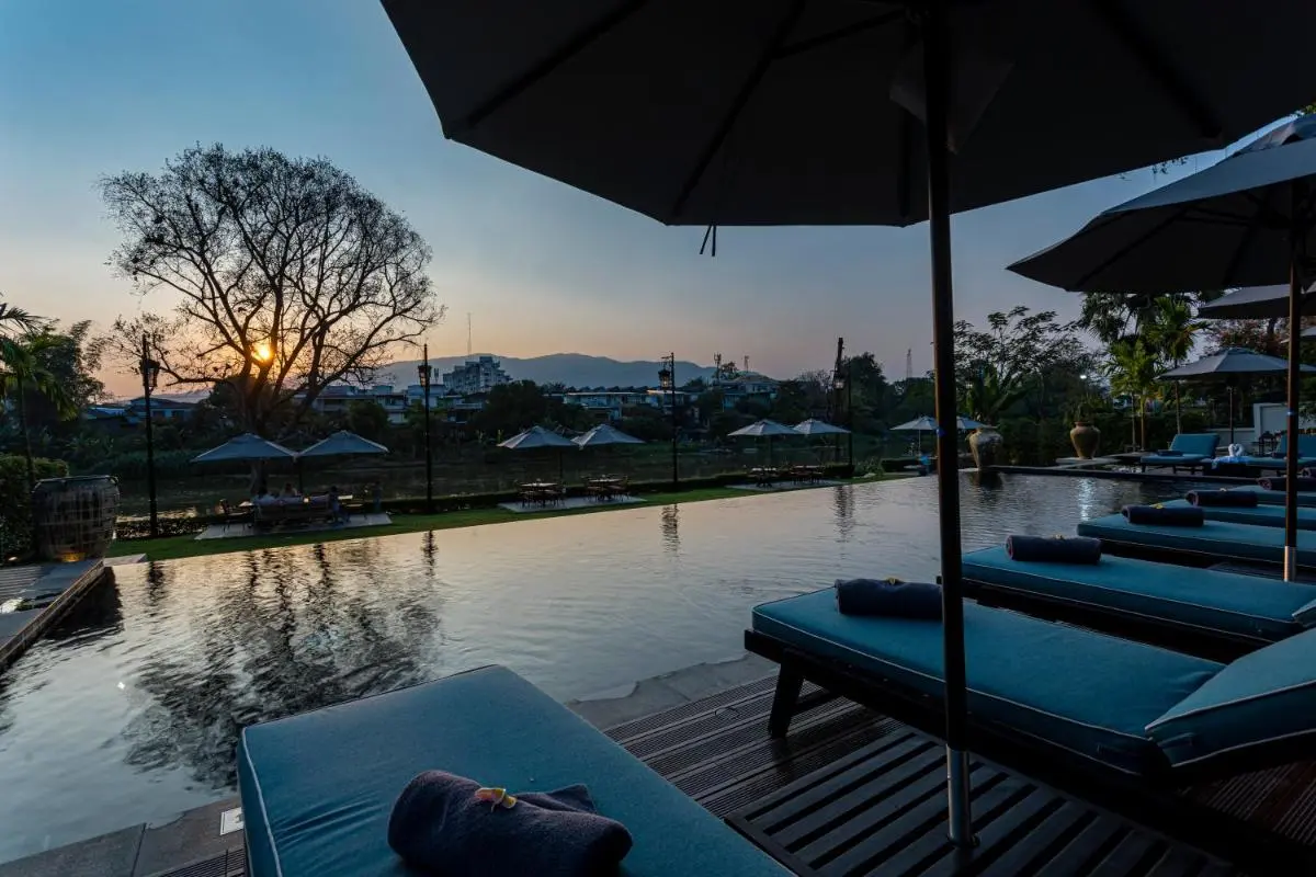 Outdoor Infinity Pool and Relaxation Area with Scenic Views in Fa Ham Chiang Mai