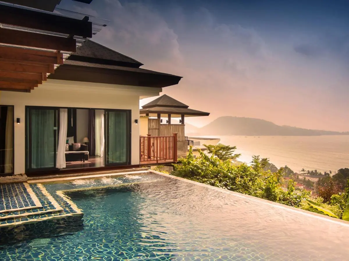 Outdoor Infinity Pool with Coastal Views and Modern Architecture at Patong Beach