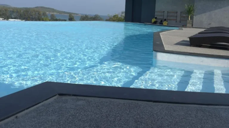 Outdoor Infinity Pool with Fitness Area and Scenic Views at Rawai Beach