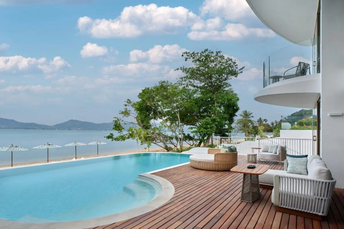 Thailand Outdoor Infinity Pool with Scenic Beach Views and Modern Seating at Panwa Beach