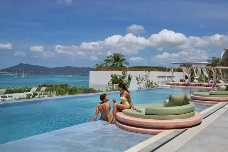 Outdoor Infinity Pool with Scenic Ocean Views and Relaxing Seating at Panwa Beach