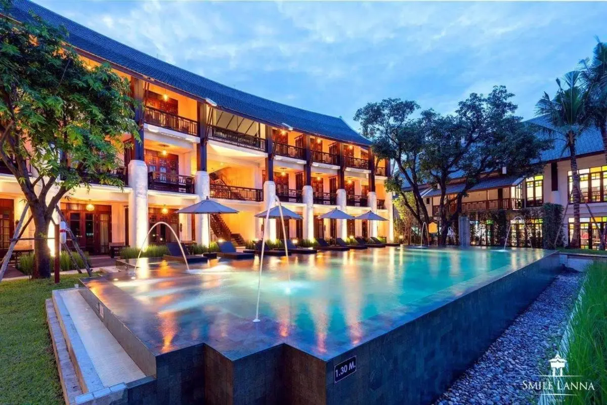 Outdoor Infinity Pool with Water Jets and Lounge Area in Hai Ya Chiang Mai