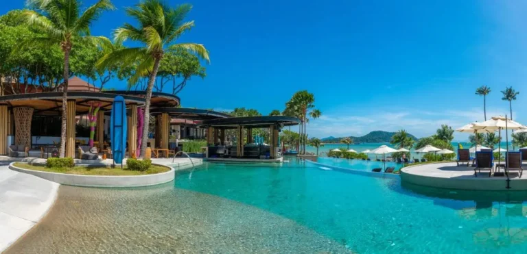 Outdoor Multi-Level Infinity Pool with Ocean Views and Tropical Seating at Panwa Beach