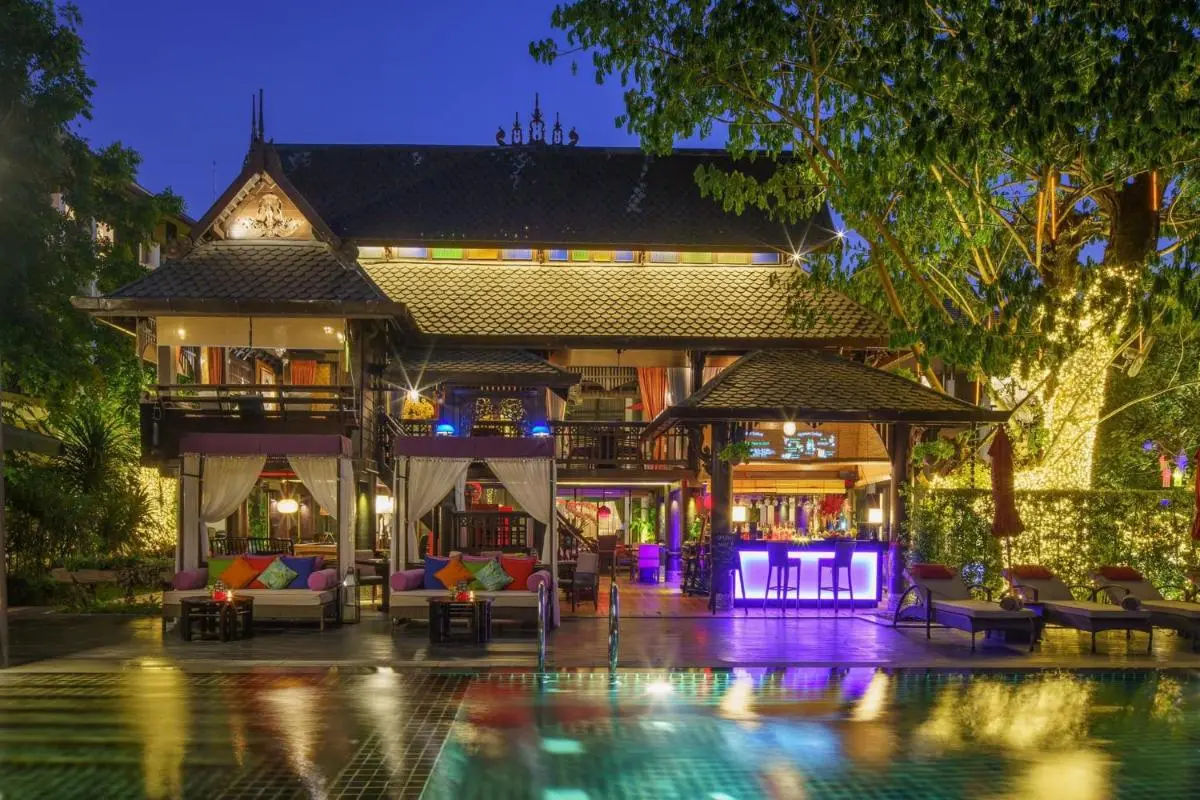 Outdoor Multi-Level Wooden Pool and Lounge Area with Bar in Phra Sing Chiang Mai