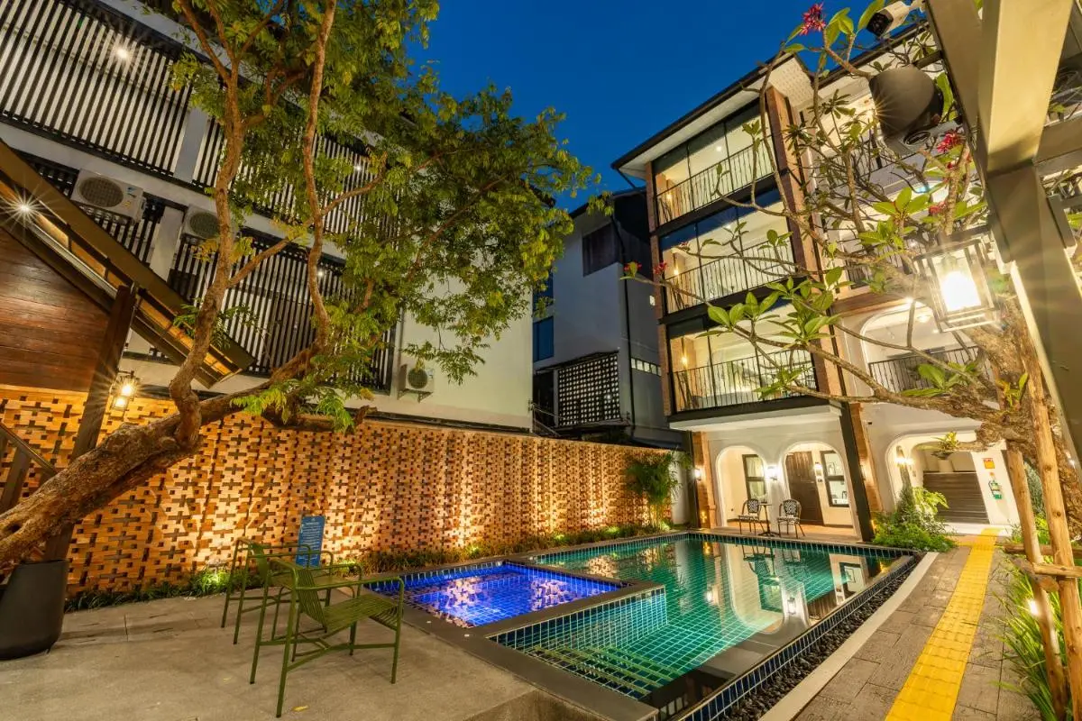 Outdoor Pool and Hot Tub Area with Balcony Views in Phra Sing Chiang Mai