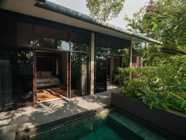 Outdoor Pool and Relaxation Area with Bedroom Views on Sentosa Island
