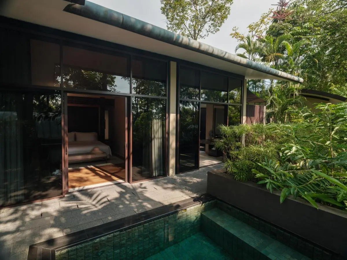Capella Singapore Outdoor Pool and Relaxation Area with Bedroom Views on Sentosa Island