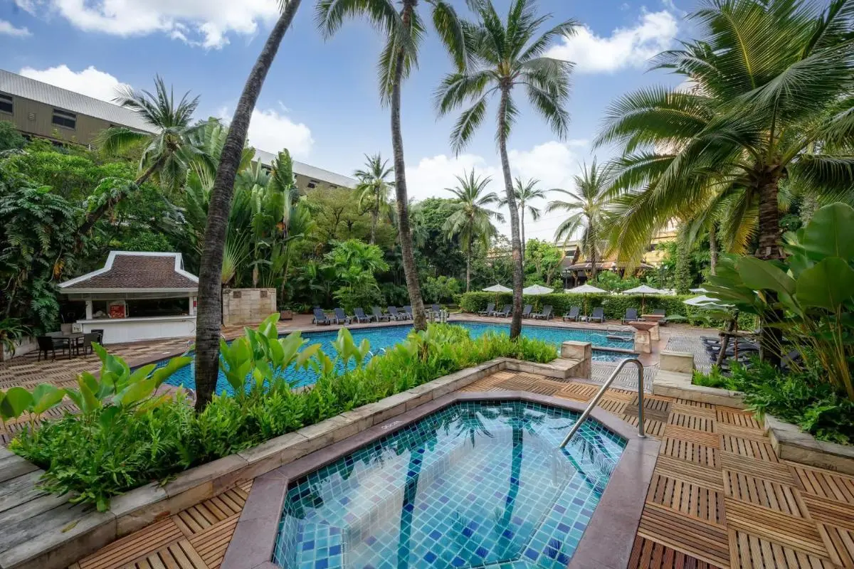 Outdoor Pool and Spa Area with Tropical Surroundings in Chatuchak Bangkok