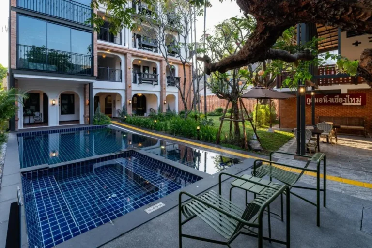 Outdoor Pool Area and Garden Seating with Lounge Chairs in Phra Sing Chiang Mai